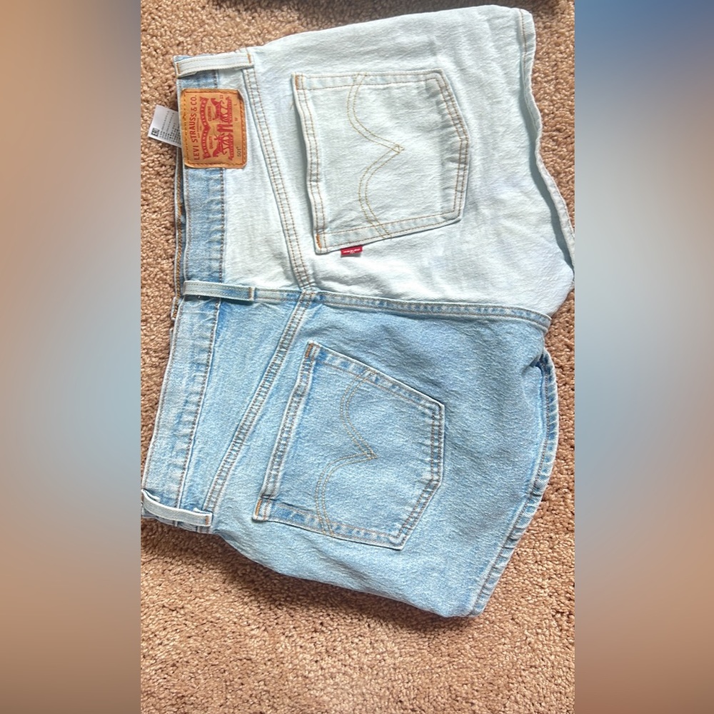 Genuine LEVIS shorts size 31. Worn only once!